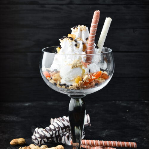 Ice-cream with dried fruits. Dessert. Top view.